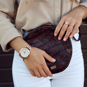 Girl Holding Brown Leather Bag And Classic Watch